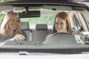 Image of two women driving in car